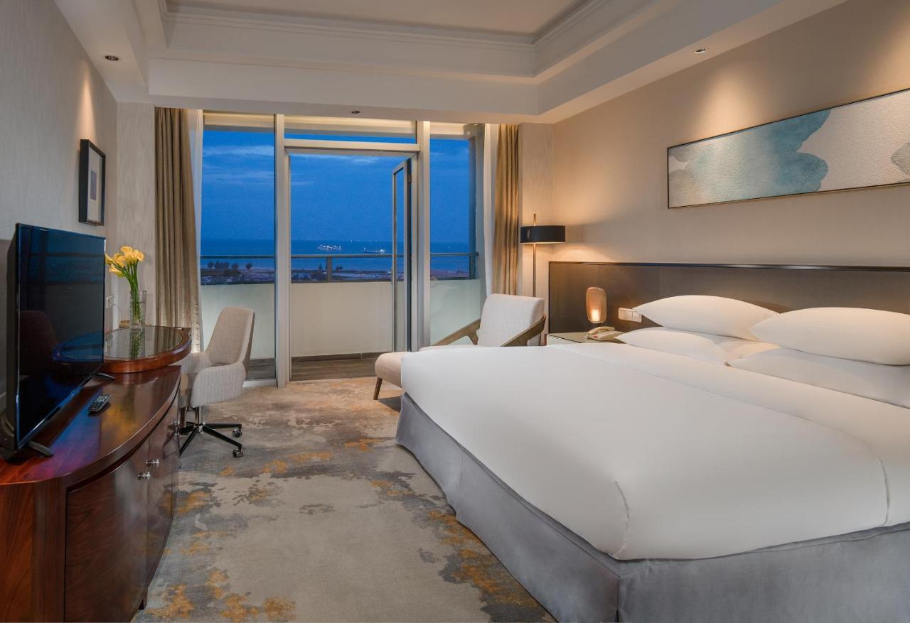 Golden Shining New Century Grand Hotel Beihai Exterior foto
